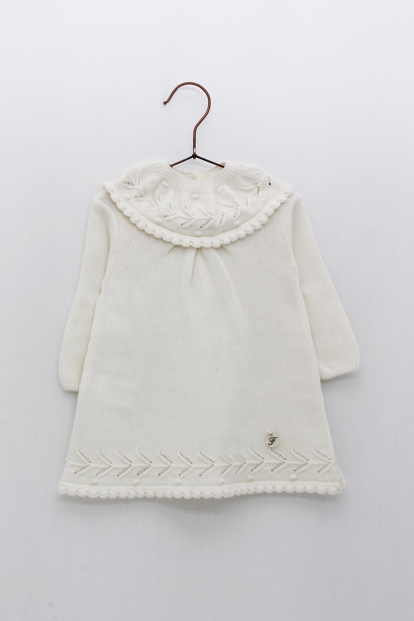 Knitted christening dress