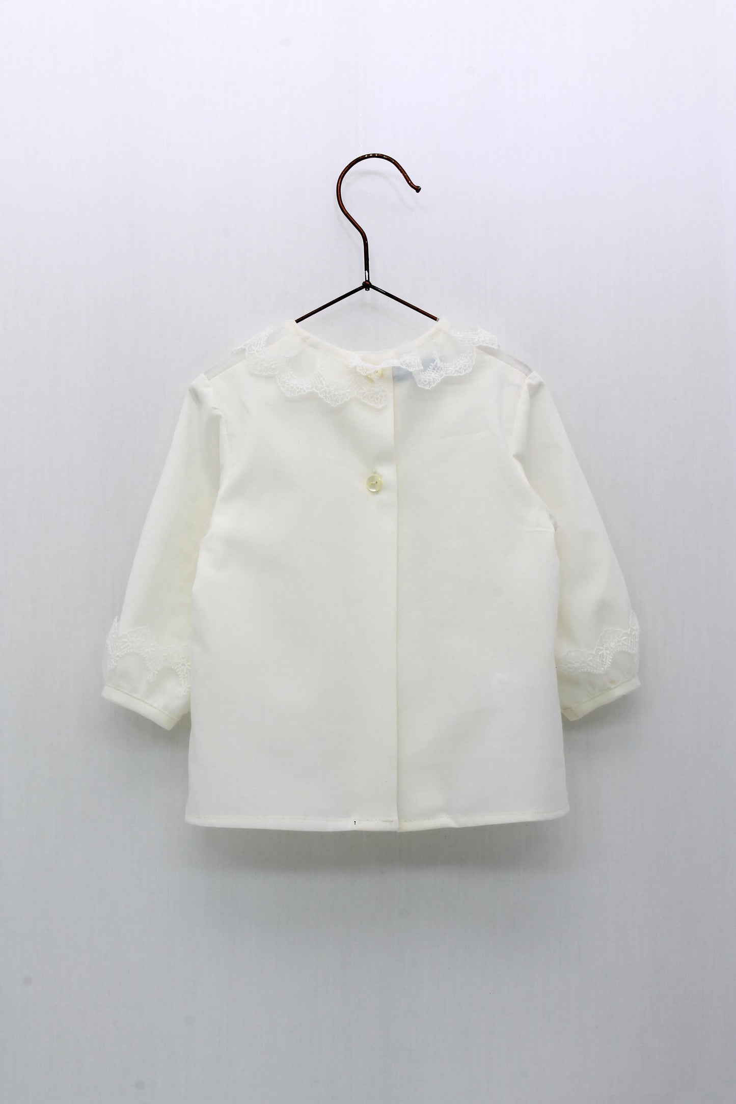 Heredia Ruffle Neck Blouse