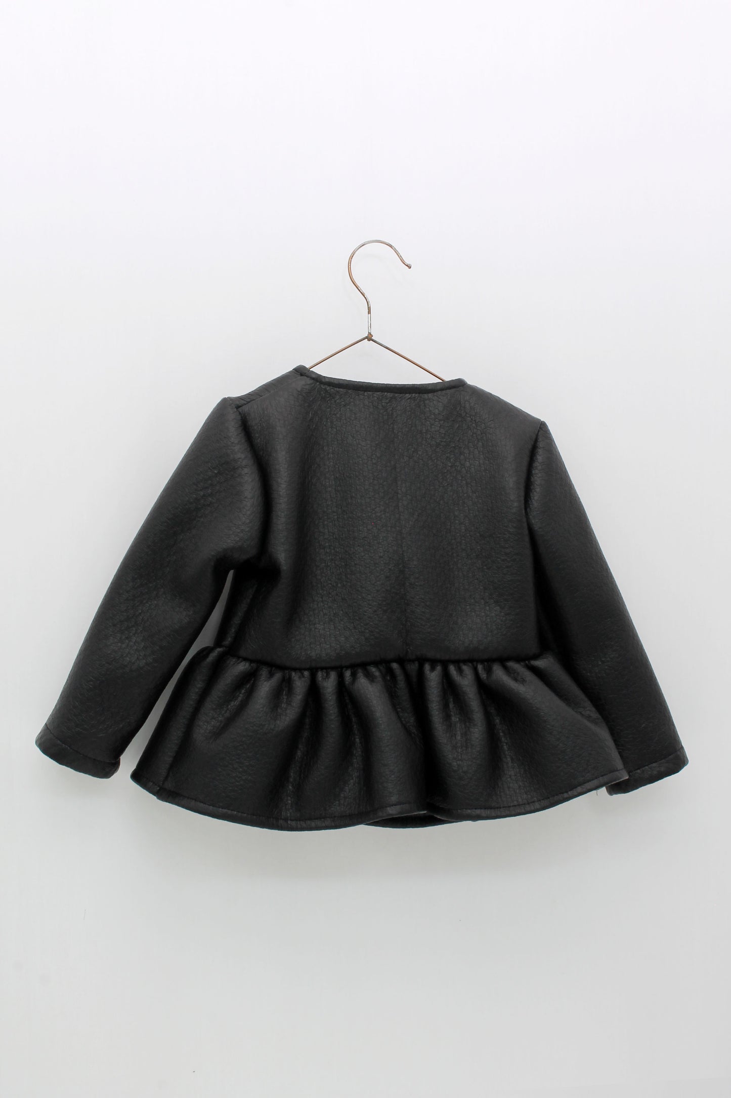 Cazadora Peplum Polipiel