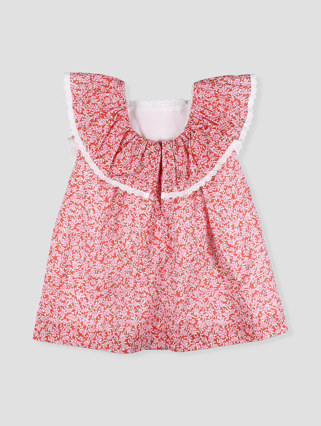 Vestido bebé niña estampado floral coral con encaje