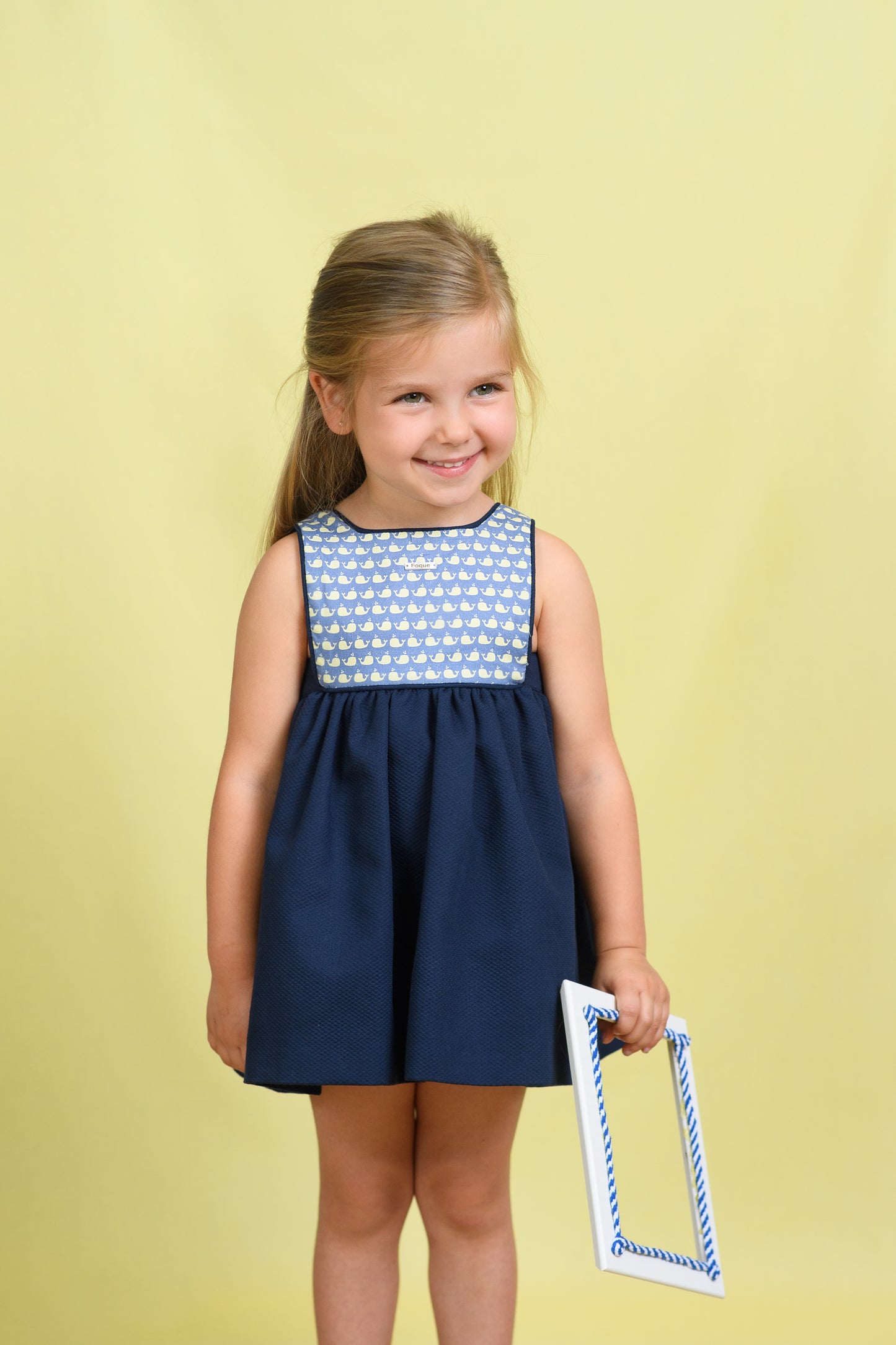 Vestido bebé niña azul marino con pechera estampada
