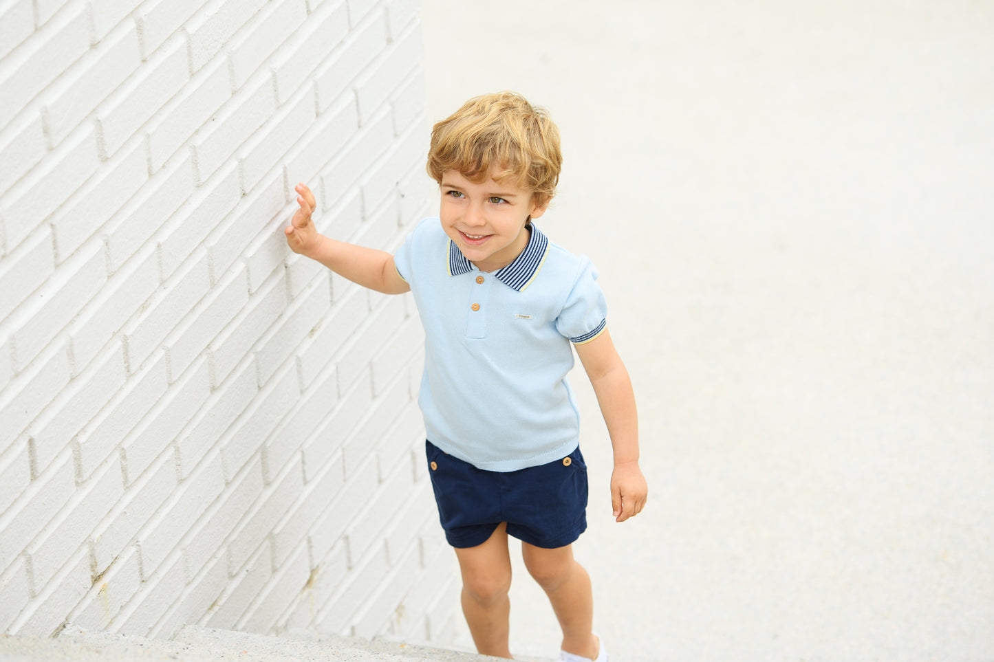Conjunto bebé niño polo celeste y short marino