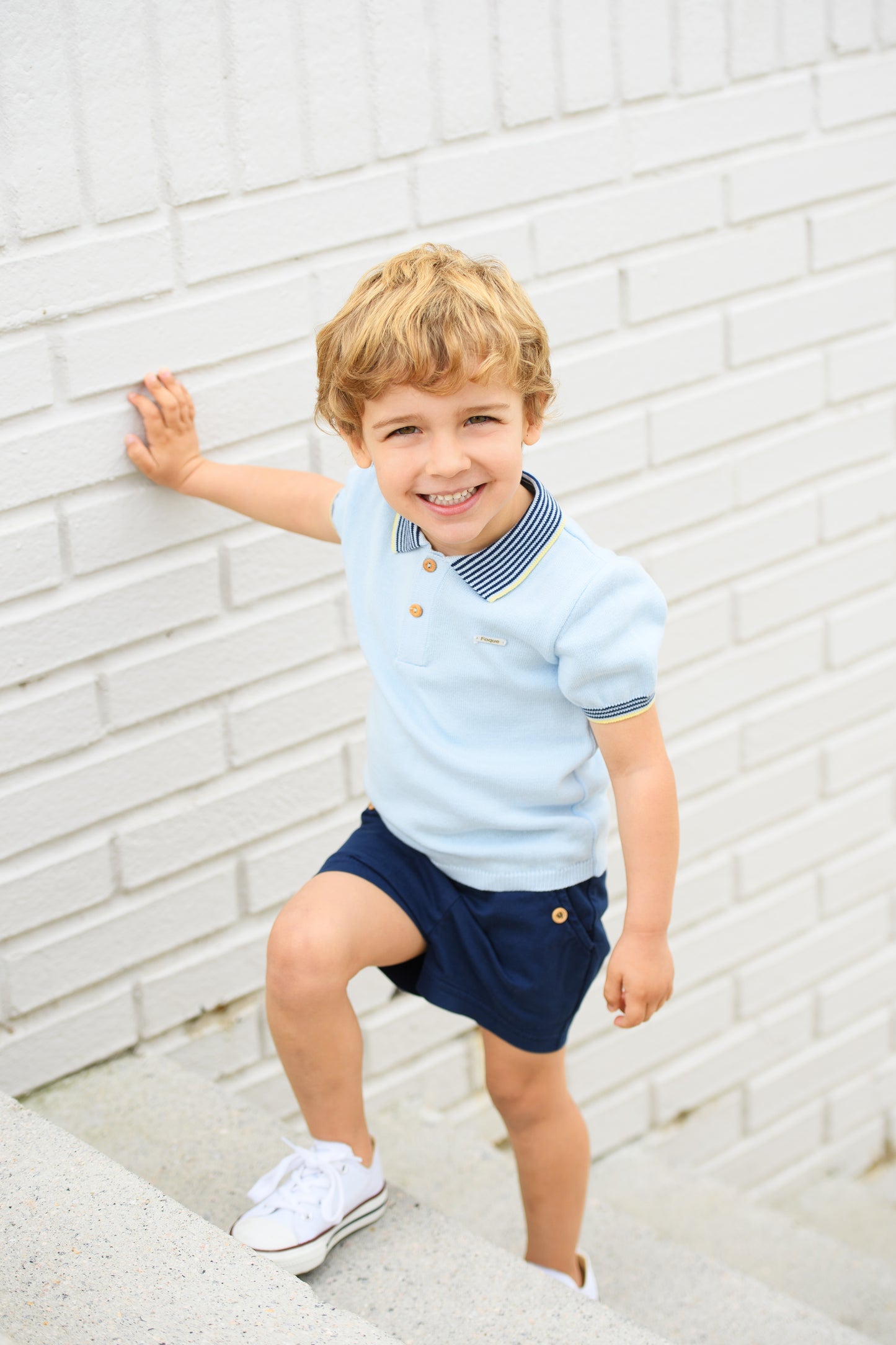 Conjunto bebé niño polo celeste y short marino