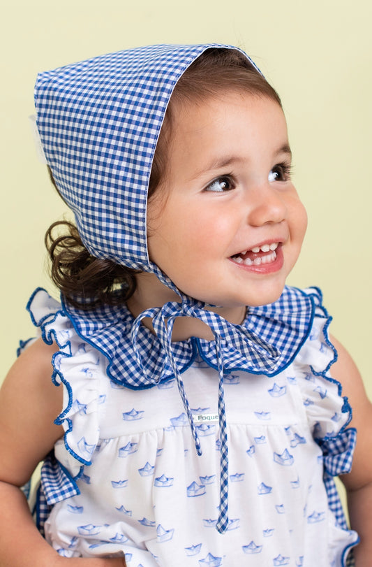 Paper boat print dress with ruffled collar and gingham bows